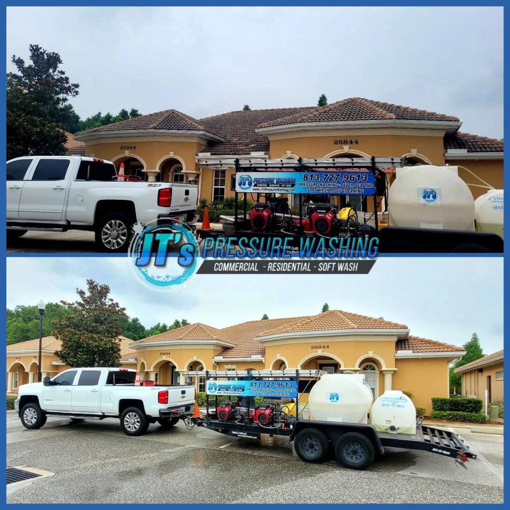 J.T.’s Pressure Washing truck and cleaning trailer outside a home
